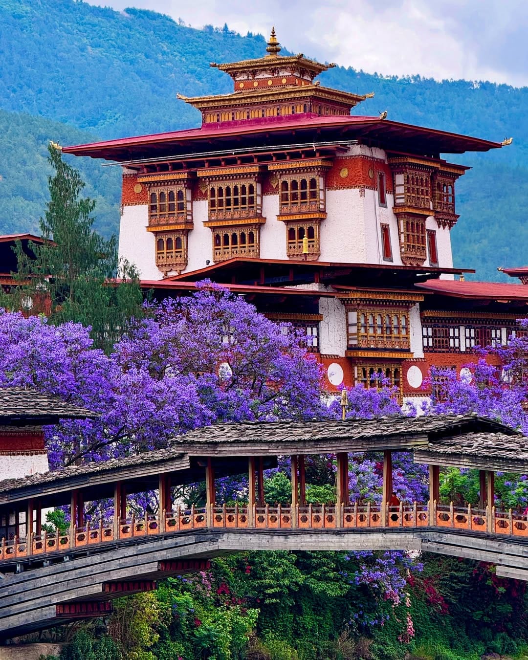 Bhutan for Indian travelers – Punakha Dzong surrounded by rivers and mountains, showcasing Bhutan’s culture and travel beauty.