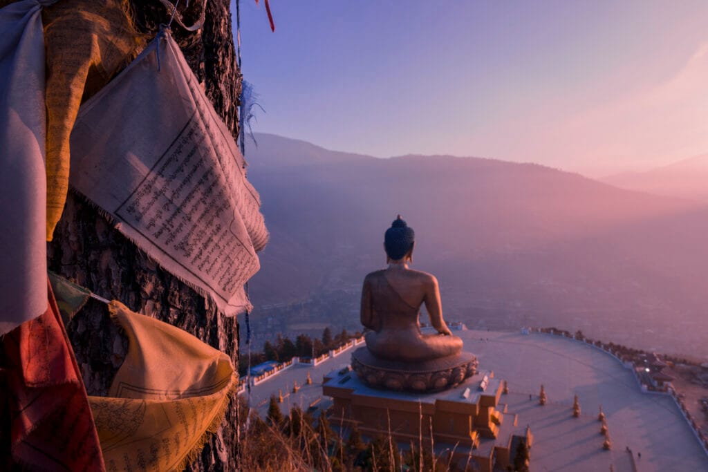 Best time to visit Bhutan – view of Buddha Dordenma statue from behind overlooking Thimphu Valley.

