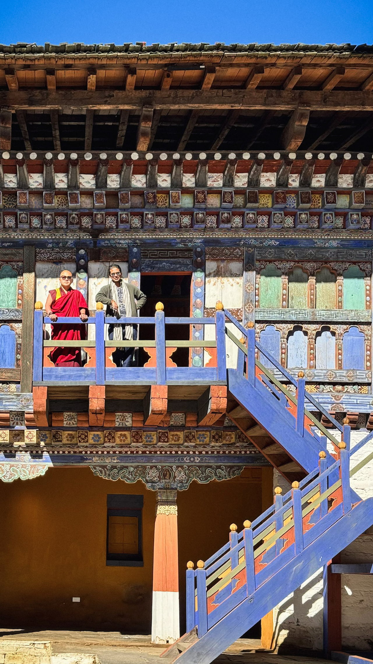Traveller on the road through a Bhutanese valley