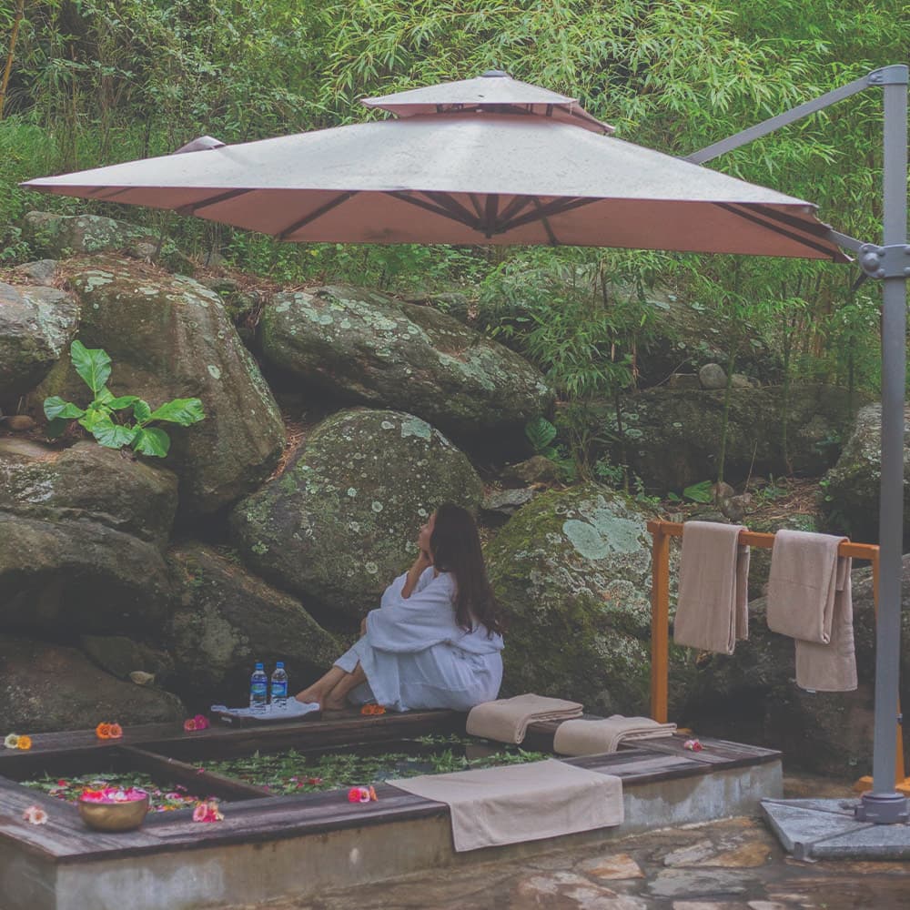 An outdoor flower-bath wellness moment in Bhutan