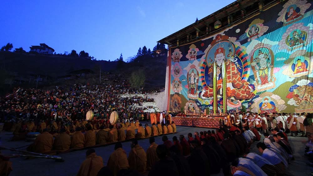 A giant thongdrel unveiled at dawn before festival crowds